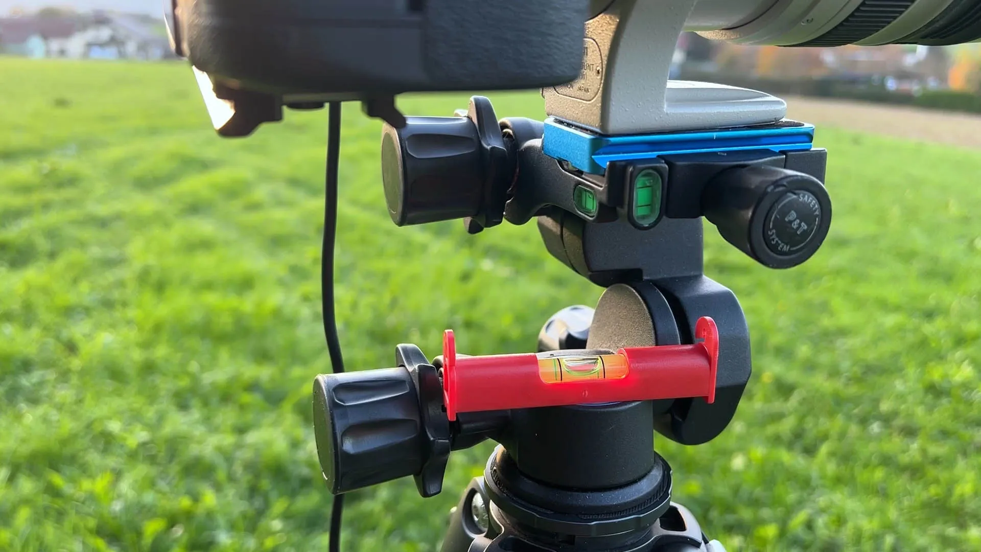 Levelling the tripod with a spirit level for a stitched panoramic photo